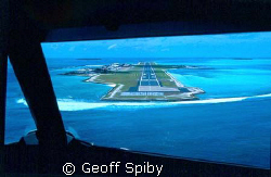 coming in to land at Hlulule airport, Maldives by Geoff Spiby 